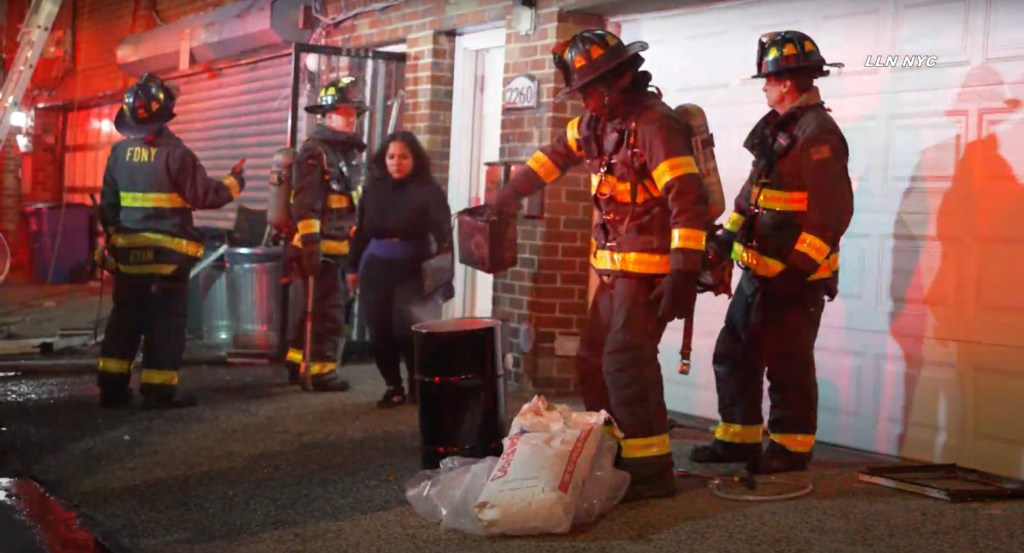 firefighters putting battery drum scene 92374800 aLvNGH