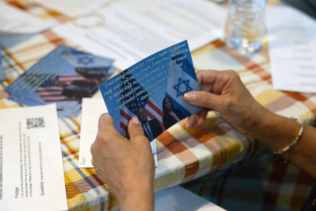 ilene miller holds postcard volunteered 91927218 ABD3Ng