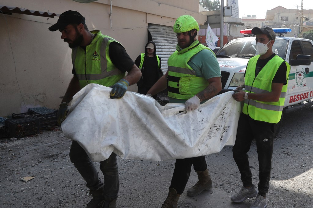 rescue workers carry remains killed 91714544 Rv7S76