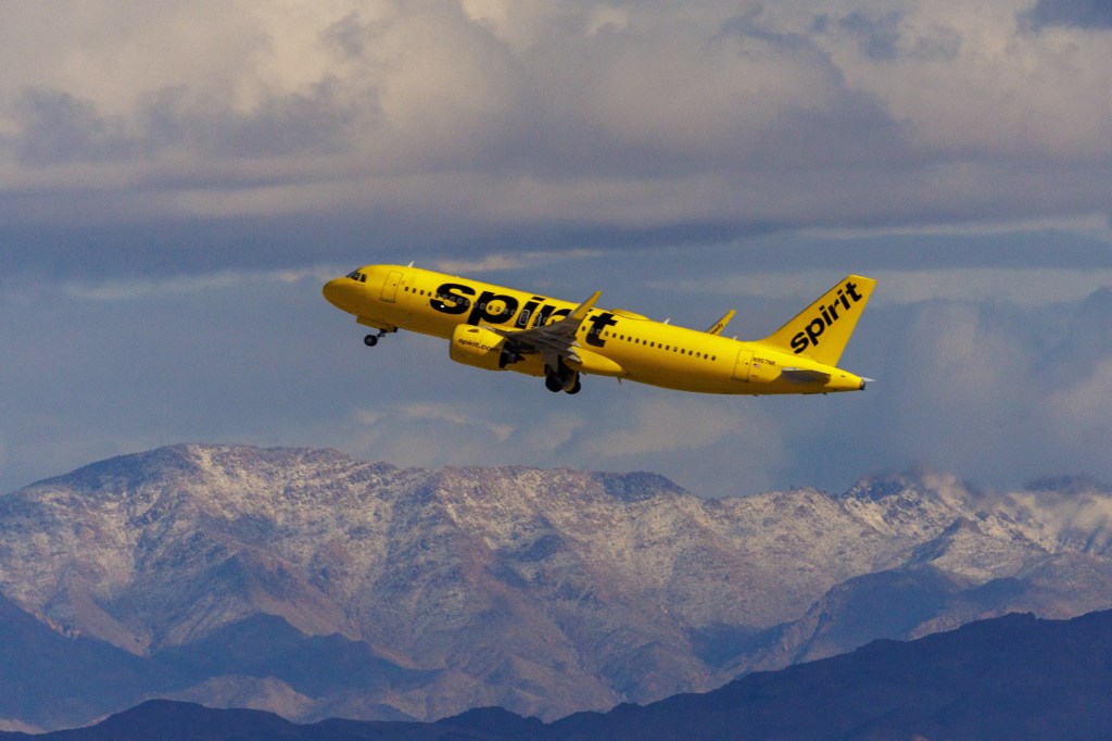 spirit airlines commercial airliner flies 91885043