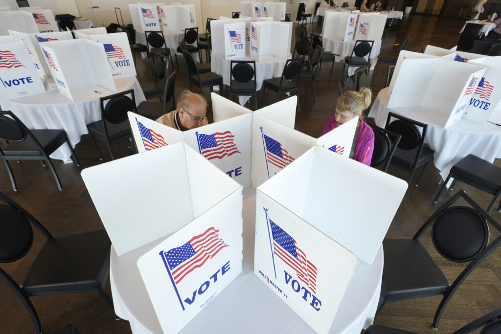 voters fill ballots michigan primary 92712317 qhTa7o