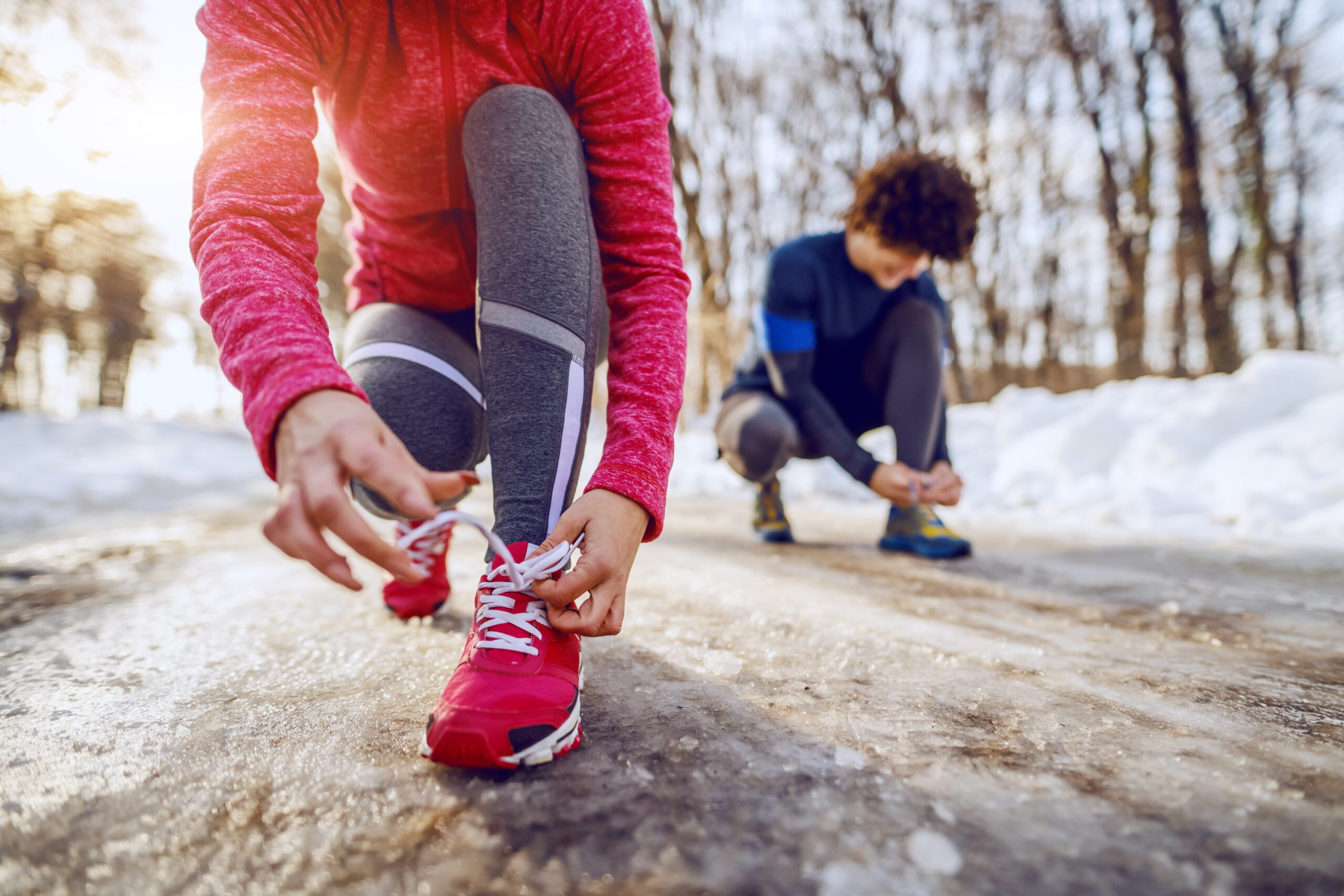 wp content2Fuploads2Fsites2F22F20242F122Fcaucasian sporty woman sportswear crouching 95793032 gIzv9k scaled