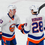 wp content2Fuploads2Fsites2F22F20252F012Fcelebrates new york islanders defenseman 96494661 5VtZnp