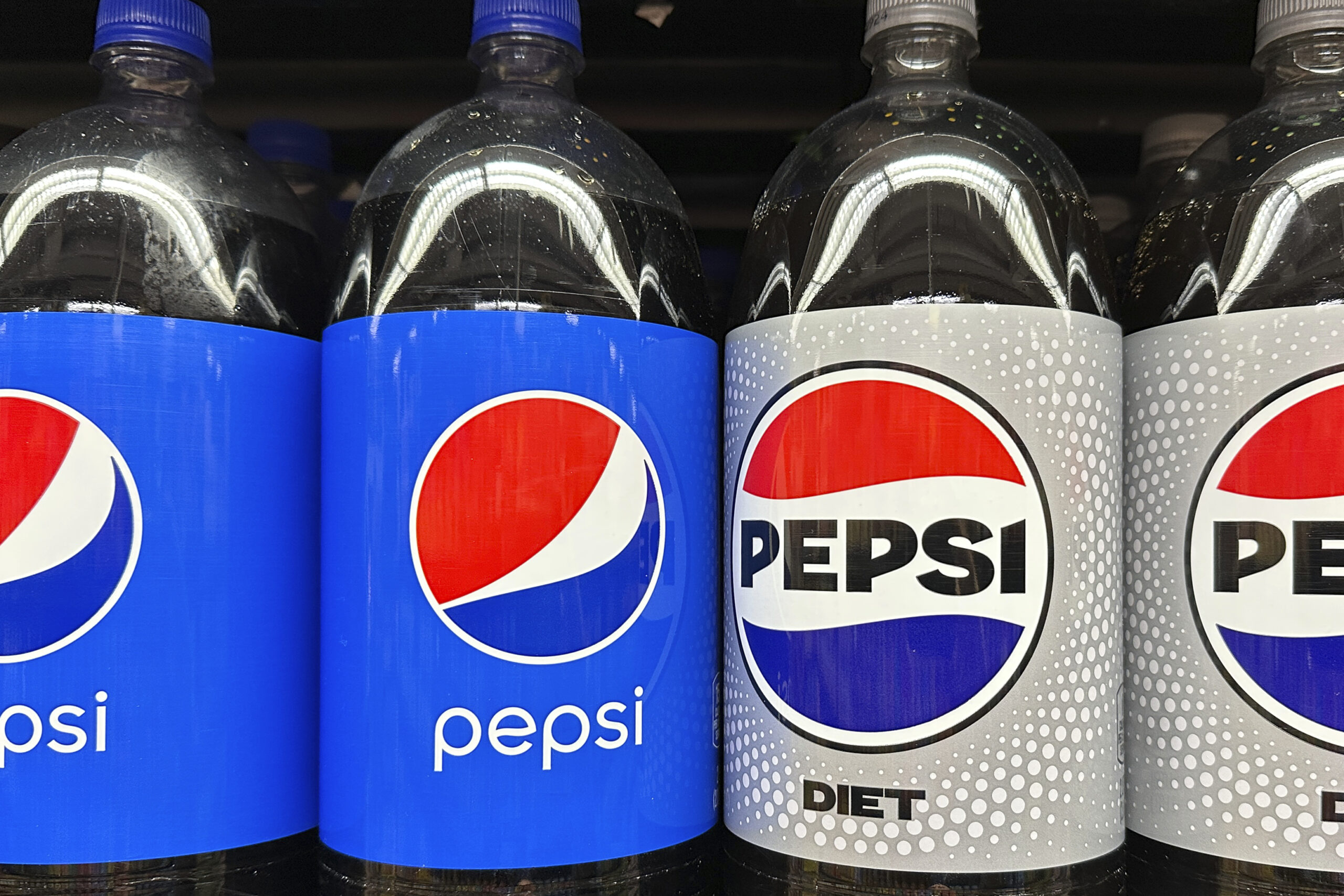wp content2Fuploads2Fsites2F22F20252F012Fpepsi soft drinks plastic bottles 92575301 WuqjUv scaled