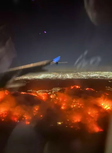 Palisades Fire forces planes to divert as passengers film fiery chaos below 1 wp content2Fuploads2Fsites2F22F20252F012Fwww instagram com vin1fx palisades 96415619 7VCQGP